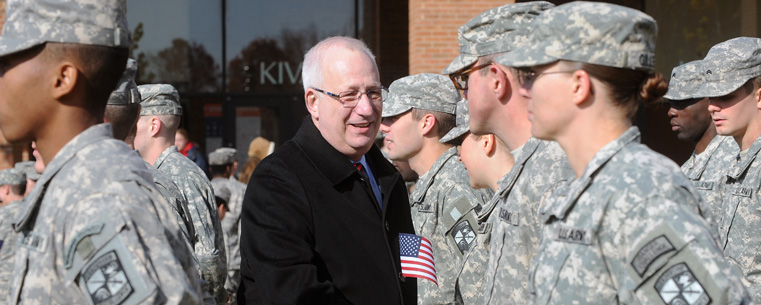 President Lester A. Lefton takes time to thank each Kent State University student cadet who participated in the annual Veterans Day ceremony on the Risman Plaza.