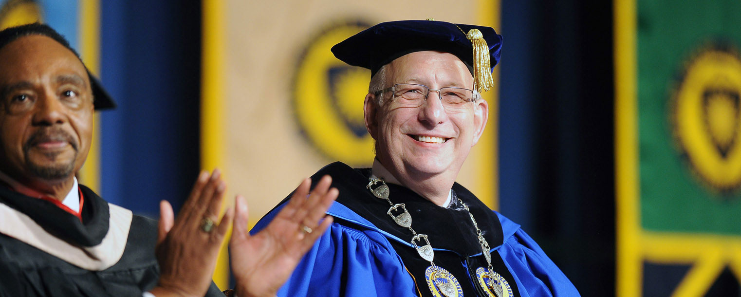 Kent State President Lester A. Lefton enjoys an enthusiastic response from incoming freshmen during Convocation.