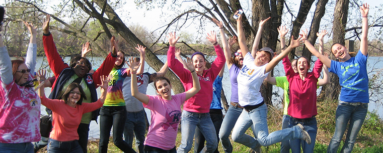 Kent State students celebrate in Washington, D.C., after planting 300 trees along the Potomac River with Earth Sangha and the National Parks.