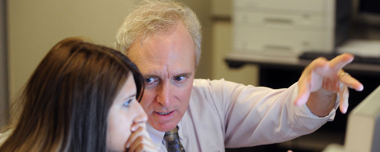 Kent State University's new School of Digital Sciences welcomed its first class of students this fall. Journalism and Mass Communication Assistant Professor Joe Murray directs a student during an in-class assignment in Franklin Hall on the campus of Kent State University.