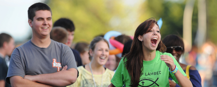 <p>Freshman students react to a friend who tried, and fell, on the bull-riding machine that was available during the Blastoff party on the all-weather track during Kent State’s Welcome Weekend 2011.<br />
</p>