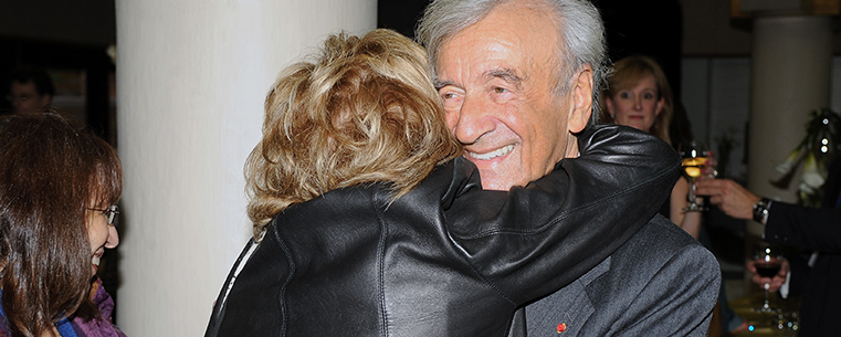 Elie Wiesel receives an emotional greeting from a friend during the pre-event reception in the Memorial Athletic and Convocation Center.