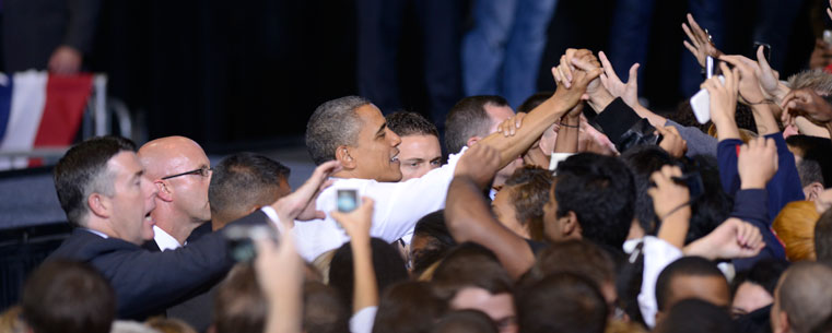 President Obama shakes hands with supporters after his speech in the MAC Center.