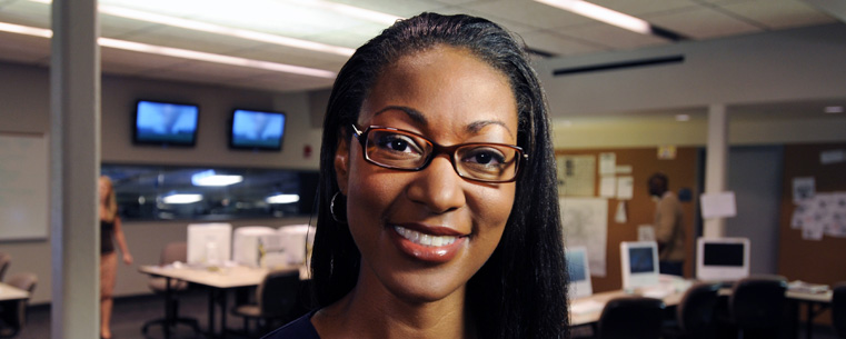 Gina Stikes-Shoehalter during a commercial shoot in the Daily Kent Stater newsroom in Franklin Hall.