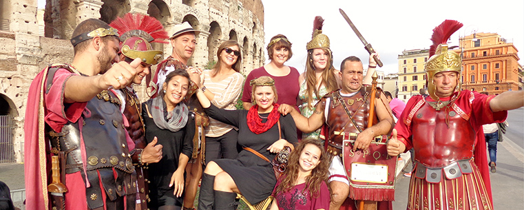 On a day trip to Rome, a group of Kent State students has fun with some “Roman Soldiers” outside of the Coliseum. (Photo provided by Kari Carnes)