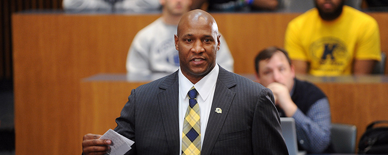 Paul Haynes addresses the football team in a meeting prior to the public announcement that he has been named the new Kent State head football coach.