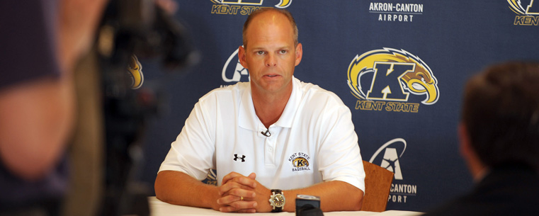 <p>Baseball coach Scott Stricklin talks to the media before the celebration in the ballroom.</p>