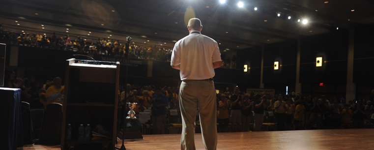 <p>Kent State head baseball coach Scott Stricklin is honored with a standing ovation after being introduced during the Season of Champions celebration Thursday night in the Student Center ballroom.</p>