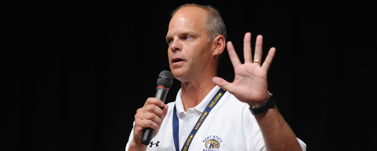 <p>Kent State baseball coach Scott Stricklin holds up five fingers denoting where the Flashes finished the season.</p>