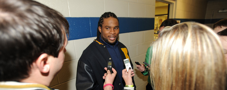 Joshua Cribbs speaks to the media after the retirement of his number during halftime.