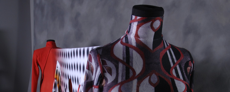 The winning piece is made up of two knit dresses on dress forms connected by a large section of fabric printed with optical illusion imagery. <br />