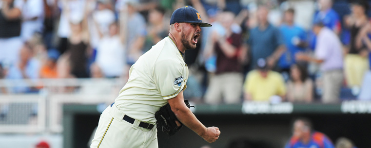 Kent State pitcher Josh Pierce reacts to Kent State's dramatic 5-4 win over the Florida Gators Monday, June 18, 2012, at TD Ameritrade Park in Omaha, Nebraska.