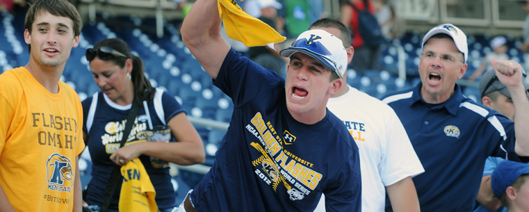 Kent State fans cheer on the team as they enter the dugout.