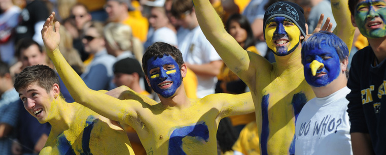 Golden Flashes student fans show their team spirit during a football game.