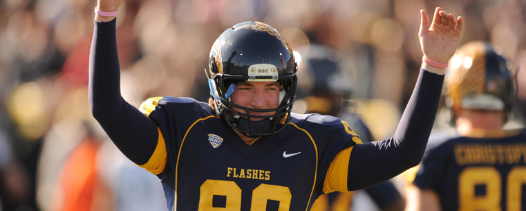 Kent State Golden Flashes long snapper Chad Bushley celebrates an extra point during the final home game against Ohio University.