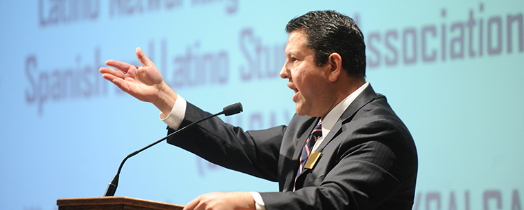 T. David Garcia, Kent State’s associate vice president for enrollment management and chair of the Latino Networking Caucus, delivers opening remarks at last year’s Hablemos (Let’s Talk) Conference in the Kent Student Center Kiva. The 2013 conference takes place April 19.<br />