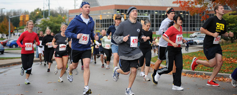 Runners participate in the 11th annual Bowman Cup 5K Race, which kicked off the 2011 Homecoming festivities.