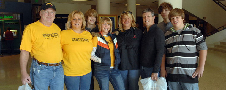 Kent State students and family members are pictured in the atrium of the Kent Student Center after shopping at the Kent State Bookstore.<br />