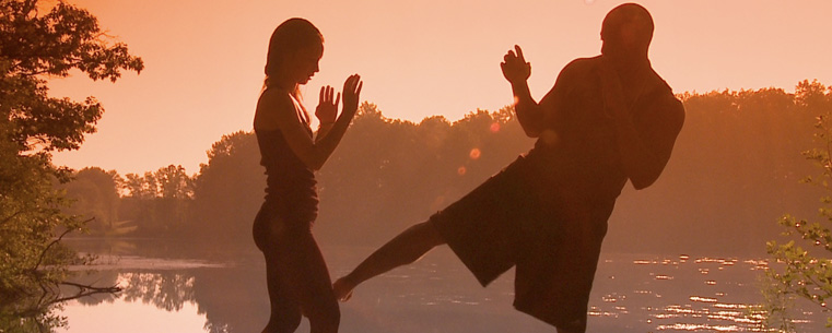 The main character, Paul Exum, and the woman playing his daughter spar at sunrise at a lake in Streetsboro.