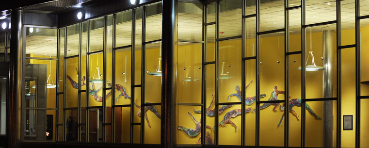 When students set foot in the lobby of the Roe Green Center, they will encounter 14 life-sized wall sculptures that fuse silhouettes of dancers and thousands of individual images from Kent State University's dance and theatre photo archives with a unique medium: sheets and large beads made of acrylic.