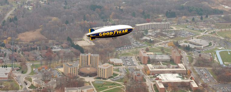 The Goodyear blimp Spirit of Goodyear flies over Kent State University during the ESPN Tip-Off Marathon game, broadcasting images of Kent State to a national audience.