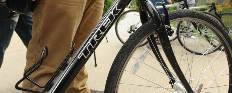 All of the bikes available in the Flashfleet are made by Trek. They have a water bottle holder and a rack for bookbags.