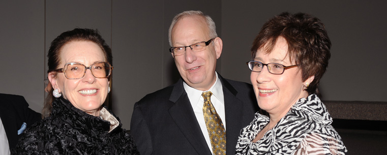 Fashion designer and Kent State graduate Linda Allard, Kent State President Lester A. Lefton and Linda Lefton share a laugh during the reception for the Kent State University Museum's 25th anniversary gala.