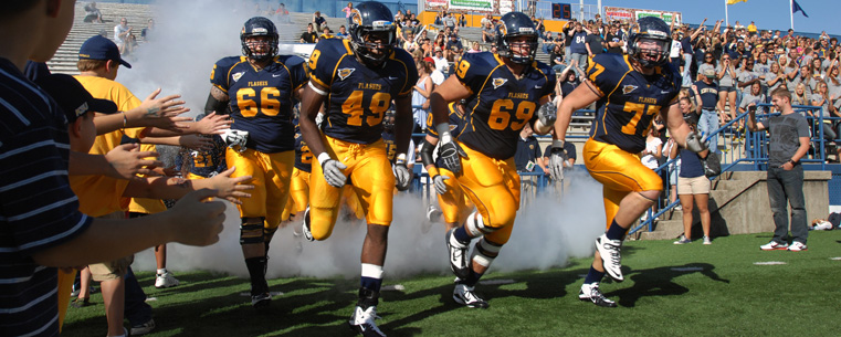 Kent State's Golden Flashes take to the field at Dix Stadium during the 2010 season.