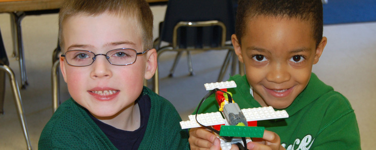 <p>Kindergarten students Simon (left), age 6, and Aiden (right), age 5, built a LEGO&reg; WeDo™ airplane with a moving propeller in Mrs. Nancy Condit's class at Kent State University's Child Development Center.<br />
</p>