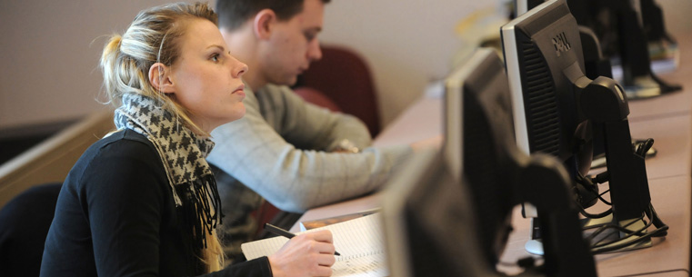 <p>A Russian student works in the applied linguistics translation classroom in Satterfield Hall.</p>