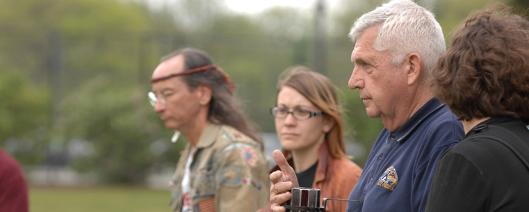 Members of the May 4 Task Force and others who stood vigil in the parking lot by Taylor Hall walk the candles from the lot to the Kent State Commons for the start of the May 4 commemoration.