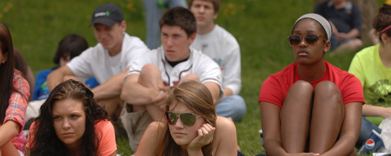 Students from Kent-Roosevelt High School listen to speakers during the 42nd annual May 4 commemoration at Kent State.