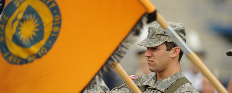 A member of Kent State's ROTC performs honor guard duties during the football game against Western Michigan Saturday, Oct. 31.