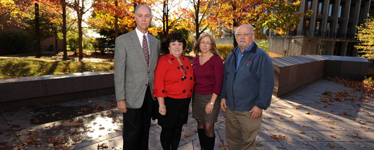 Kent State University professors Mark Seeman, Carole Barbato, Laura Davis and emeritus professor Jerry M. Lewis, pictured at the May 4 Memorial on the Kent State campus, were honored with a 2010 Ohio Historic Preservation Merit Award.