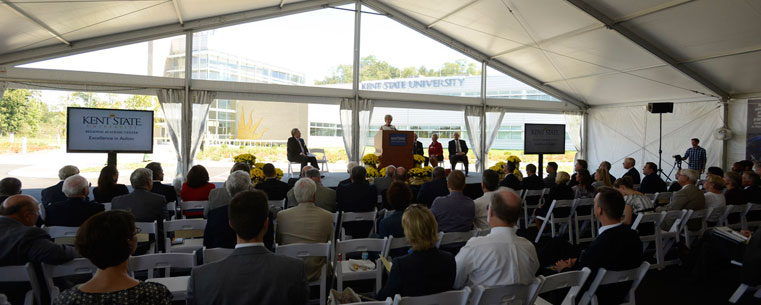 Dr. Lester A. Lefton, Dean David Mohan and members of the Board of Trustees cut the ribbon on the Kent State University Regional Academic Center in Twinsburg.