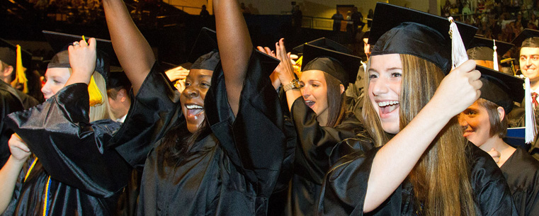 <p>Kent State University graduates celebrate during the summer commencement ceremony.</p>