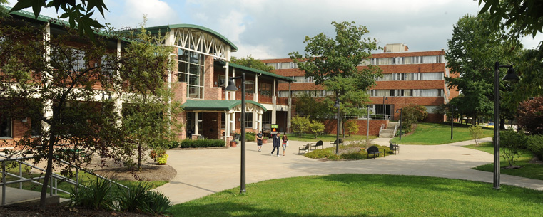 <p>Students walk from the Eastway Center to class. The Eastway Center is a hub of campus life. It offers food, entertainment and recreation and is connected to four residence halls.<br />
</p>