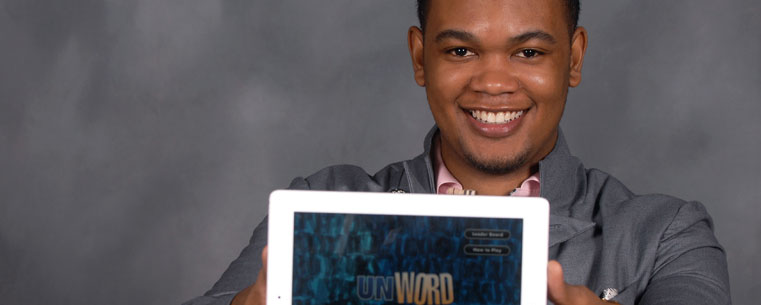 Kent State University senior and entrepreneur Ryan Glen Golphin shows off this Itunes app &quot;UnWord&quot; on an Ipad.