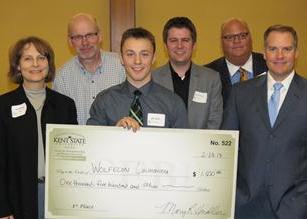 Photo of Kent State student Jake Wolfe with competition judges