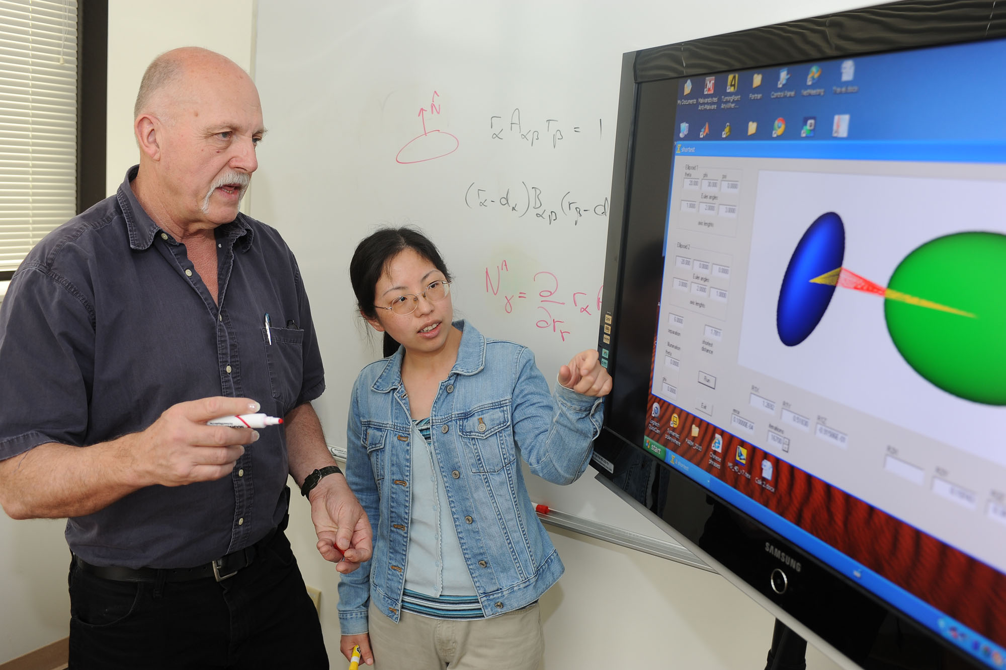 Kent State University researchers Peter Palffy-Muhoray and Xiaoyu Zheng