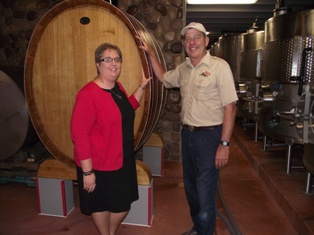 Lori Lee, Office of Academic Services, Kent State University at Ashtabula, stands with Tony Debevec, owner of Debonne Winery, at the winery in Madison, Ohio.