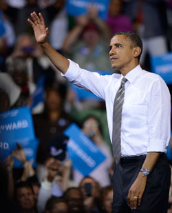 President Obama greets the crowd in the MAC Center.