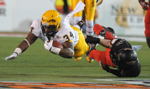 Trayion Durham is tackled during the first half of the bowl game. 