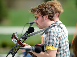 A musical act performs on the Student Green as part of FlashFest 2013, an annual event for Kent State students.