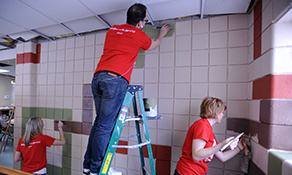 Kent State students put the final touches on the walls at the King Kennedy Community Center in Ravenna, Ohio.